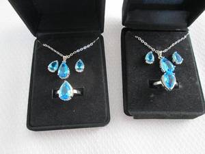 lot 37 image: 2 Dazzling SeaBlue Teardrop Pendant...