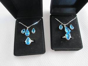 lot 38 image: 2 Dazzling SeaBlue Teardrop Pendant...