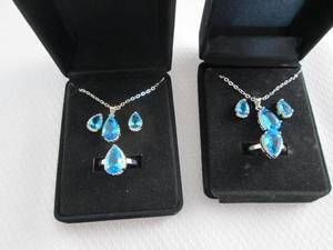 lot 39 image: 2 Dazzling SeaBlue Teardrop Pendant...