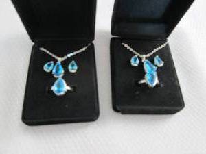 lot 41 image: 2 Dazzling SeaBlue Teardrop Pendant...