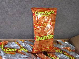 lot 176 image: 24- 1.7 oz Diana Corn Curls Churrit...