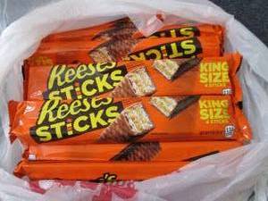 lot 216 image: 12- 3.0 oz Reeses Sticks...