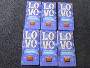 lot 250 image: 6- 2.82 oz Love Almond Chocolate...