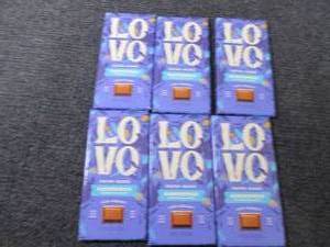 lot 253 image: 6- 2.82 oz Love Almond Chocolate...