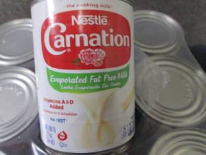 lot 294 image: 12-12 oz Carnation Fat Free Evapora...