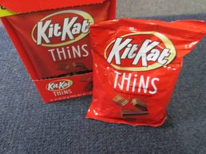 lot 302 image: 8- 3.1 oz KitKats Thins...