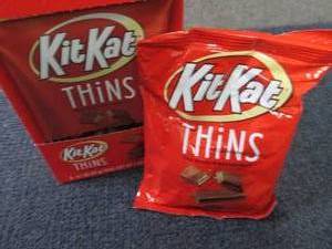 lot 305 image: 8- 3.1 oz KitKats Thins...