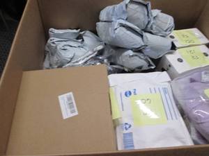 lot 342 image: Box of UnsoldUnclaimed Small Overs...