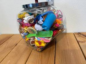 lot 35-C2025 image: Vintage General Store Candy Jar Filled With 100 Small Toys from 1950s to 2000S Star Wars, Care Bears, Lovely Locks, Liddle Liddie, etc..