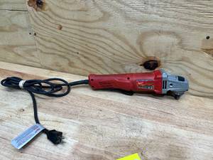 lot 124 image: Milwaukee 11 Amp Corded 4-12 in. Small Angle Grinder Paddle No-Lock