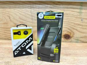 lot 203 image: Car Road Trip Kit Including ATOM Fusion Wireless Earbuds Headset and Numi Power Stand