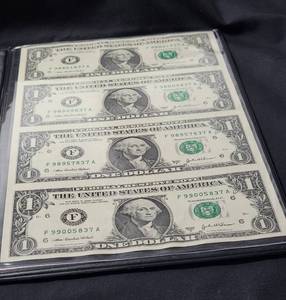 lot 4 image: 1 UNCUT SHEET OF 4  US $1 BILLS with HOLDER.  Series 2003A.   