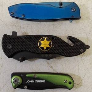 lot 12 image: 3 Foldable Pocket Knives - (1) Blue - 3CR13 Steel Blade (1) Sheriff Knife (1) John Deere Knife (View Photos)