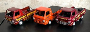 lot 236 image: Dougs Headers, Little Red Wagon and Chuck Pooles Chuckwagon Model Trucks by Johnny Lightning