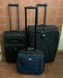 lot 46 image: Three Rolling Luggage  Suitcases by Travel Pro and Atlantis