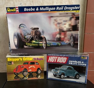 lot 50 image: Revell Beebe & Mulligan Rail Dragster, Swindler II Willys Coupe and 1951 Angilia Skippers Critter Model Car Kits