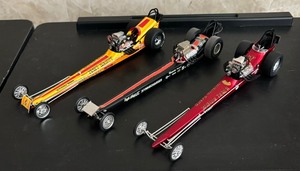lot 58 image: Tony Nancy Sizzler, Brice Wheeler Dealer Top Fuel and Don Garlits Wynns Charger Dragster Model Cars