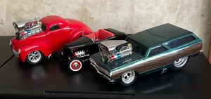 lot 77 image: Three Model Cars by Ertl and Funline