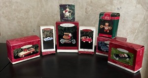 lot 86 image: Hallmark Keepsake Ornaments including 1956 Ford Thunderbird, Cheery Cyclists, Murray Fire Truck and More