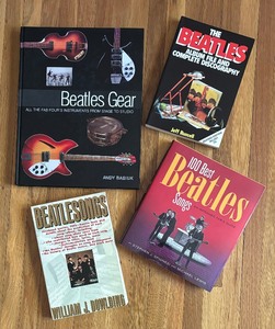 lot 135 image: Four Books on the Beatles including Beatles Gear, The Beatles Album File & Complete Discography, 100 Best Beatles Songs and More