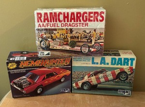 lot 151 image: MPC Ram Chargers AA Fuel Dragster, Hemi Hunter and L.A. Dart Model Car Kits