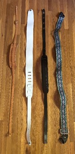 lot 179 image: Four Awesome Guitar Straps