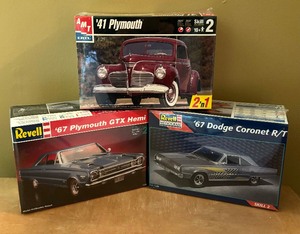 lot 270 image: New Revell Monogram 1967 Dodge Coronet RT, Revell 1967 Plymouth GTX Hemi and AMT Ertl 1941 Plymouth Model Car Kits