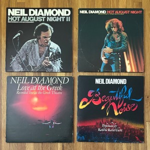 lot 53A image: Four Neil Diamond Record Albums including Beautiful Noise, Hot August Night, Love at the Greek and More