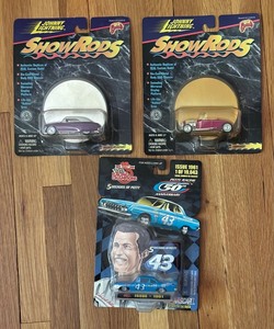 lot 272 image: New Johnny Lightning Show Rods and Racing Champions Decades of Petty Cars