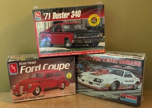 lot 34A image: New AMT Ertl 19391940 Ford Coupe, Monogram Pro Stock Camero and AMT Ertl 1971 Duster 340 Model Car Kits