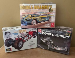 lot 265 image: New Revell IVOs Showboat 4 Engine Dragster, AMT Double Whammy 1953 Hemi Studebaker and AMT Ertl Wynns Jammer Model Car Kits