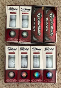 lot 303 image: New Titleist and Taylor Made Golf Balls