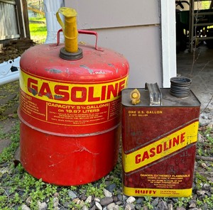 lot 397 image: Five and One Gallon Gas Cans