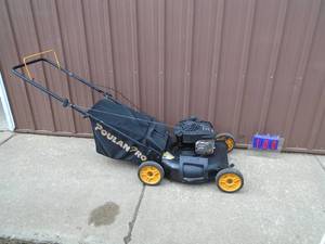 Poulan Pro push mower with bagger. Good condition. Tested & works. As shown.