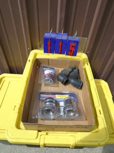 lot 115 image: Flat of radiator test adaptors. As shown.