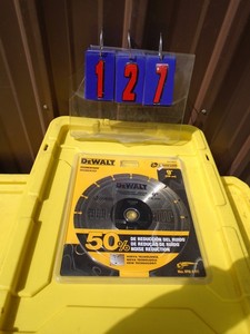 lot 127 image: New Dewalt 9 diamond blade. As shown.