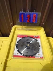 lot 128 image: New 10 50t carbide thin kerf. 58 arbor. As shown.