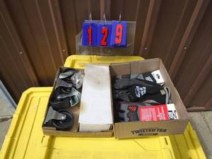 lot 129 image: Flat of new Large & X Large gloves & casters. As shown.