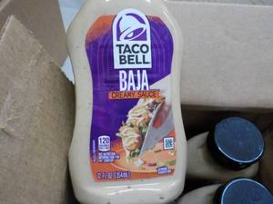 lot 209 image: 8 ct Taco Bell BAJA Creamy Sauce 12...