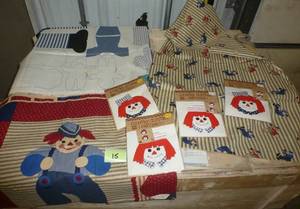 lot 15 image: Raggedy Ann fabric to make your own dolls, wall hangings, fabric patches with buttons