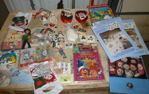 lot 16 image: Lot of Raggedy Ann transfers, socks, books, toys, vintage salt and pepper