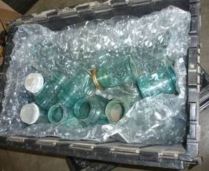 lot 77 image: Tote full of blue jars, approx 29 mostly quart size