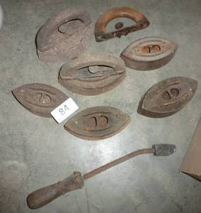 lot 84 image: Group of sad irons