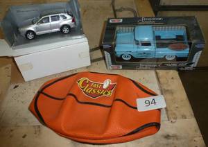 lot 94 image: Toy car and pickup and basketball