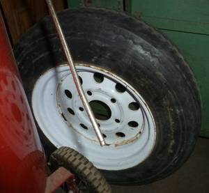 lot 102 image: spare utility tire and rim 5.30-12