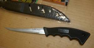 lot 137 image: Two filet knives and 10 fishing towels