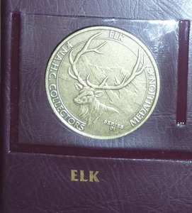 lot 150 image: 75 Black bear and 75 elk coins