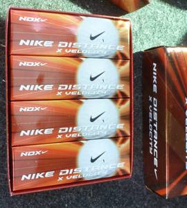 lot 56 image: Dozen new Nike golf balls