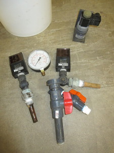 lot 180 image: SOLAR, DIGITAL THERMOMETERS AND VALVES WITH BUCKET