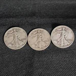 lot 28 image: (3) 1942 Walking Liberty 50C